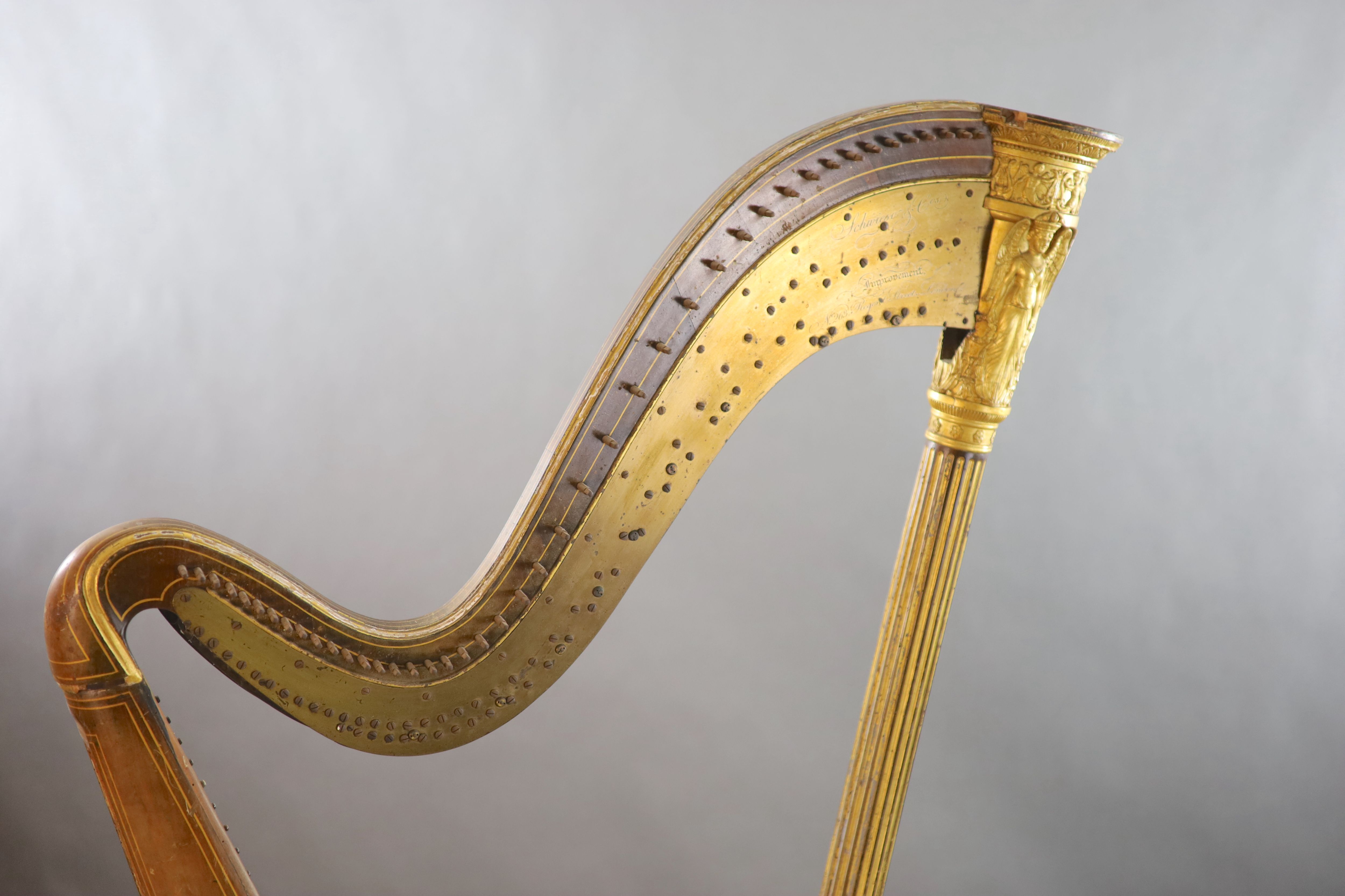 A mid 19th century J.Schwieso giltwood, satinwood and rosewood concert harp, W.2ft 9in. H.5ft 7in.